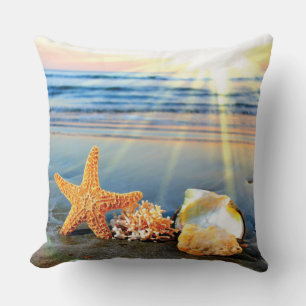 Sea shells and starfish on beach throw pillow