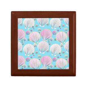 Sea shells on a turquoise blue background gift box