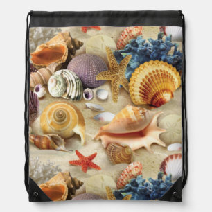 Sea shells on beach drawstring bag