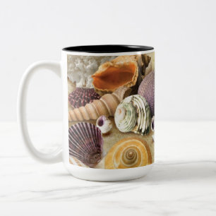 Sea shells on beach Two-Tone coffee mug