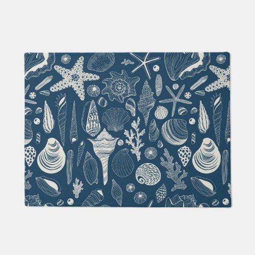Sea shells on  dark blue doormat