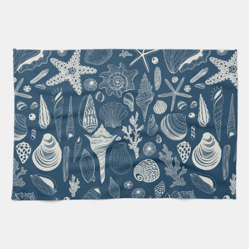 Sea shells on  dark blue kitchen towel