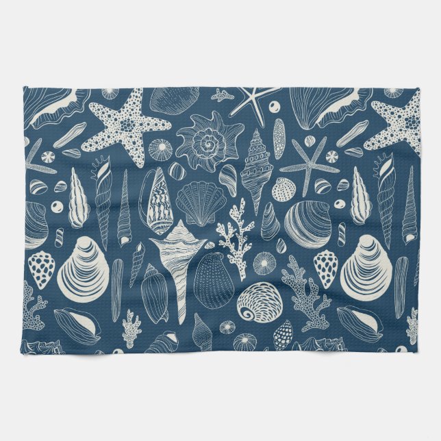 Sea shells on  dark blue kitchen towel (Horizontal)