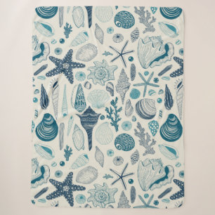Sea shells on off white sherpa blanket