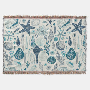Sea shells on off white throw blanket
