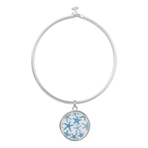 Sea stars in blue bangle bracelet