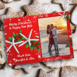 Sea Stars n Holly Photo Red Christmas Cards<br><div class="desc">Photo template, flat Christmas card with starfish and holly design. Add a vertical (portrait) photo, framed in red, over a twinkling stars, red background. White sea stars and green holly leaves decorate the center of the card and wrap behind the photo for a layered effect. Chunky script is customizable in...</div>