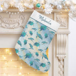 Sea Turtle Christmas Tropical Beach Sparkle Small Christmas Stocking<br><div class="desc">This personalized coastal themed stocking features a pattern of cute turquoise blue sea turtles on an abstract beach background with a faux glitter wave and sparkly star accents. Check out the collection for more matching products,  or contact me through Zazzle Chat if you need something special.</div>