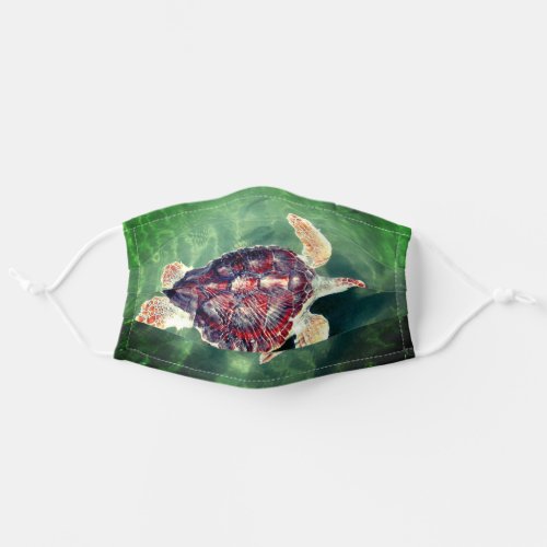 Sea turtle in green ocean _ bestseller face masks