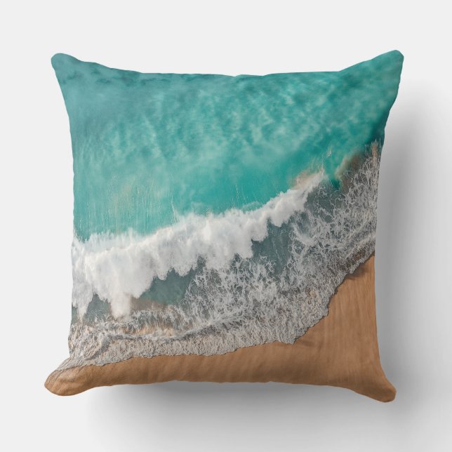 Sea waves wash over the sandy beach throw pillow (Front)