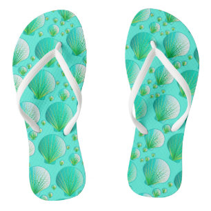 Seafoam green seashells on aqua flip flops