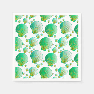 Seafoam green seashells on white napkins