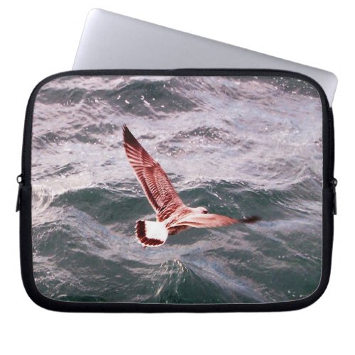 SEAGULL FLYING OVER THE WAVES LAPTOP SLEEVE