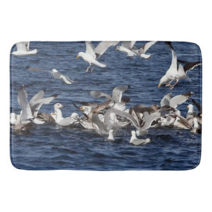 Seagulls Feeding on Sand Eels Over Ocean Art Bath Mat