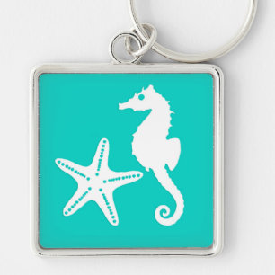 Seahorse & starfish - white on turquoise keychain