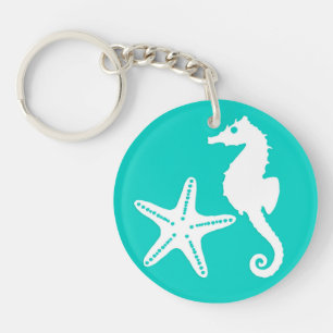 Seahorse & starfish - white on turquoise keychain