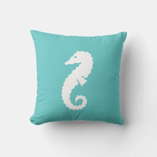 SEAHORSE WHITE on teal blue pillow