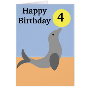 Seal balancing a yellow ball age cards