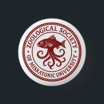 Seal of the Zoological Society of Miskatonic Button<br><div class="desc">This blood-red emblem represents the Zoological Society of Miskatonic University—a clandestine academic order devoted to the study of unnatural biology and abyssal lifeforms. Featuring a stylized marine crest with arcane flourishes, this seal evokes forbidden research far beyond conventional science. A perfect insignia for mythos scholars and collectors of Lovecraftian institutions....</div>