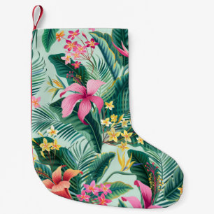 seamless floral tropical pattern with hibiscus and small christmas stocking