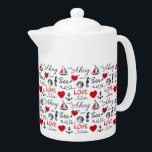 Seamless nautical pattern teapot<br><div class="desc">Seamless nautical pattern with nautical symbols (sailing boat,  anchor,  waves,  seahorse,  seashell) and red hearts decoration with text design on white background</div>