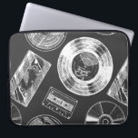 Seamless pattern with Audio and video carriers. Vi Laptop Sleeve<br><div class="desc">Seamless pattern with Audio and video carriers. Vinyl record,  tape reel,  compact tape cassette,  VHS and compact disc.</div>