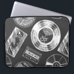 Seamless pattern with Audio and video carriers. Vi Laptop Sleeve<br><div class="desc">Seamless pattern with Audio and video carriers. Vinyl record,  tape reel,  compact tape cassette,  VHS and compact disc.</div>