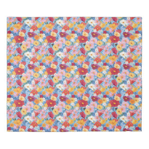 Seamless pattern with colorful flowers on a blue Duvet Cover