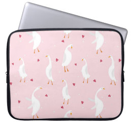 Seamless pattern with cute duck with heart on pink laptop sleeve