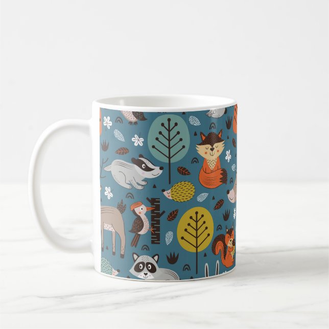 Seamless pattern with forest animals on blue backg coffee mug (Left)