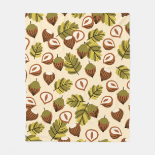 Seamless pattern with hazelnut leaves and acorns. fleece blanket