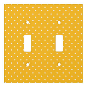 Seamless yellow-orange polka dot pattern light switch cover