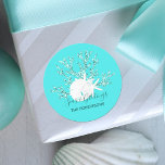 Seas and Greetings Christmas Dark Aqua Blue  Classic Round Sticker<br><div class="desc">This coastal Christmas sticker has the holiday message “Seas & Greetings” with a sand dollar and starfish on glitter coral,  on a bright aqua blue background.
*If you would like this design on more products or need design help,  please contact me through Zazzle Chat.</div>