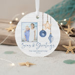 Seas and Greetings Seashell Holiday Photo Ornament<br><div class="desc">Seas and Greetings Seashell Ornament on Coastal Wood Holiday Christmas Photo Ornaments featuring ocean navy blue and sandy tan shell ornaments hanging from sailing jute rope on coastal shiplap wood with elegant typography. Add two of your photos and a personal message for a fun nautical holiday ornament or gift. Please...</div>