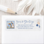 Seas and Greetings Seashell Nautical Wood Photo Label<br><div class="desc">Seas and Greetings Seashell Ornament on Coastal Wood Holiday Christmas Photo Return Address Labels featuring ocean navy blue and sandy tan shell ornaments hanging from sailing jute rope on coastal shiplap wood with elegant typography. Add your photo and return address for a fun nautical holiday address label. Please contact us...</div>