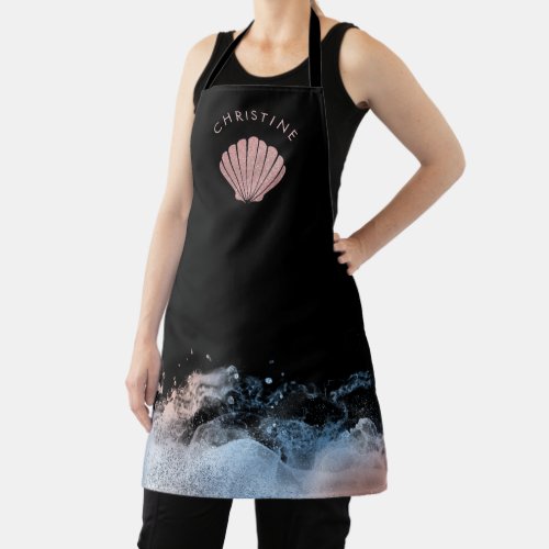 seashell logo on black apron