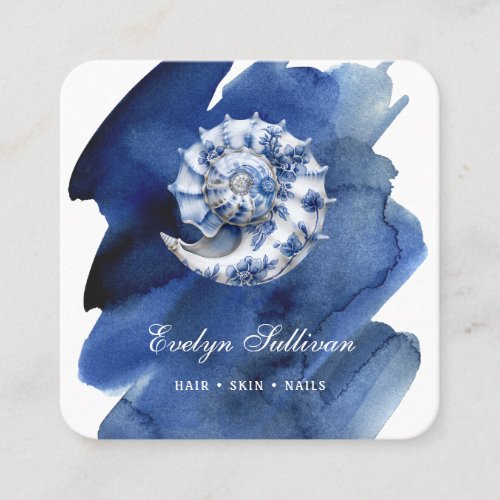 Seashell logo on blue watercolor business card