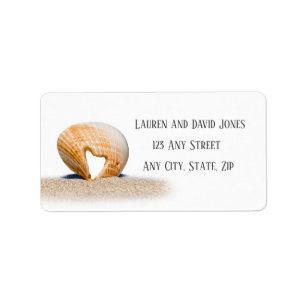 Seashell with a Heart on sand at the Beach, Label