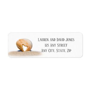 Seashell with a Heart on sand at the Beach, Label