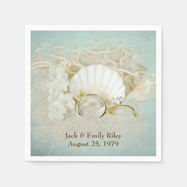 seashells and wedding rings in sand napkins (Front)