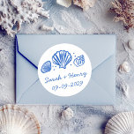 Seashells Beach Wedding Blue White CUSTOM  Classic Round Sticker<br><div class="desc">Perfect cute sticker for a fun wedding or engagement! Hand made art for you! Perfect for a wedding, seaside bridal shower, bachelorette party, engagement party, anniversary or even special birthday. FULLY CUSTOMIZABLE! Click on “Personalize” above to edit the text.. Click "edit using design tool" to adjust the fonts, colors and...</div>