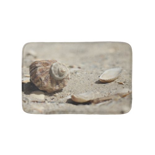 Seashells On Sand By The Sea Bath Mat