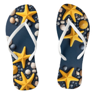  Seashells, starfish, and pebbles on a sandy beach Flip Flops