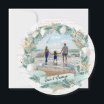 Seashore Beach Christmas Wreath with Photo Holiday Card<br><div class="desc">Starfish and Sand dollar,  holiday wreath photo Christmas greeting card,   Tropical beach holiday greeting with editable text and your favorite photo.  Beautiful wreath frame adorned with seashells and treasures from the sea shore.  Vintage beach inspired Christmas card.</div>