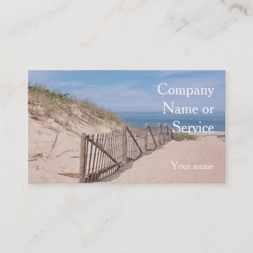 Seashore scene with beach fence and sand dune business card