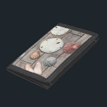 Seashore Treasures Trifold Wallet<br><div class="desc">Megan Meagher is known for her simple art pieces. This image captures the simplicity of the seashore's treasures, including sand dollars and seashells in a pastel colored tone. Meagher encompasses a wooden background in her image to contrast these treasures. Get this fine art print today on wood color on your...</div>