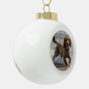 "Seaside Fun: A Cocker Spaniel Play in the Ocean Ceramic Ball Christmas Ornament