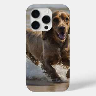 "Seaside Fun: Cocker Spaniel at Play in the Ocean iPhone 15 Pro Case