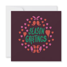 Season greetings in green handwriting with hearts