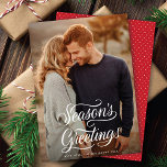 Season's Greetings Elegant Script Christmas Photo  Holiday Card<br><div class="desc">This festive holiday photo card features one vertical full-frame (aka "full-bleed") photo and a beautiful script greeting in white. The greeting on the front reads "Season's Greetings". The back has a coordinating red and white dot pattern. You can also add another photo and/or additional text to the back.</div>